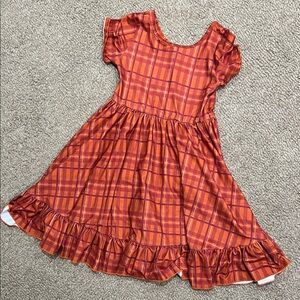 Vibrant Plaid Dress with Ruffle Hem